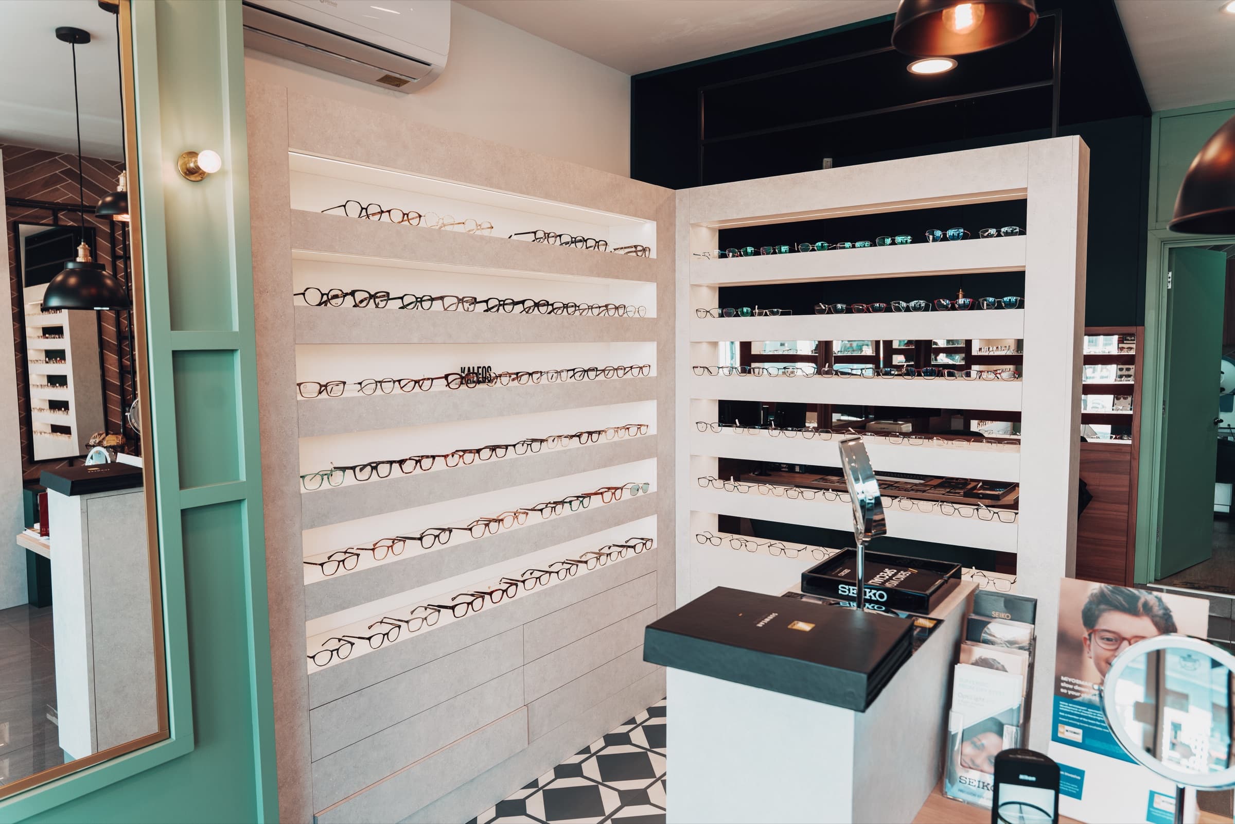 Wide interior view of the Spectacle dispensing area and frame walls